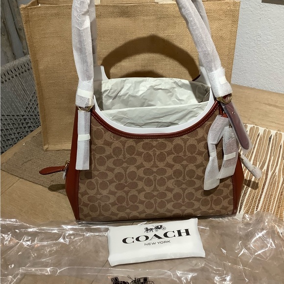 Coach - Picture 2 of 9